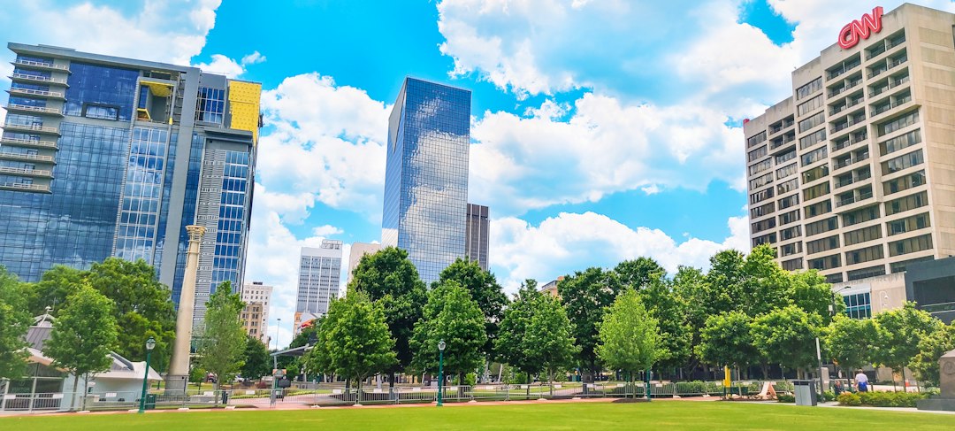 The modern skyline of downtown Atlanta, Georgia, with sleek skyscrapers representing a dynamic US real estate hub undergoing significant change.